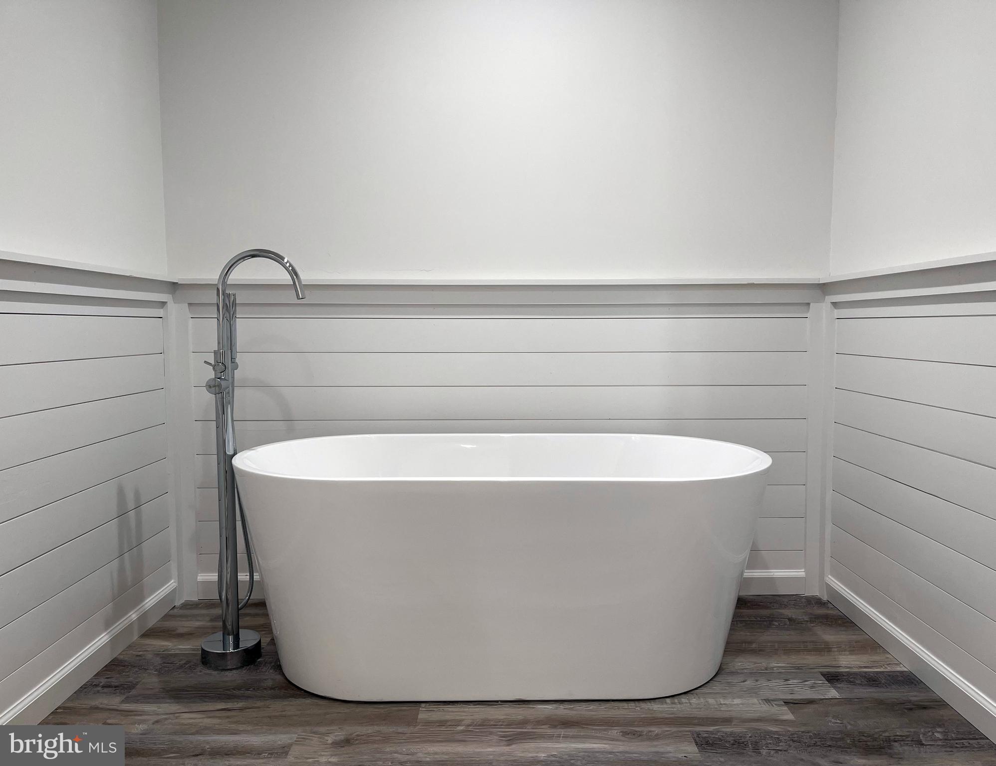 345 Pine Grove Road Hanover, PA 17331 - Photo 18 of 37 a white bath tub sitting in a bathroom