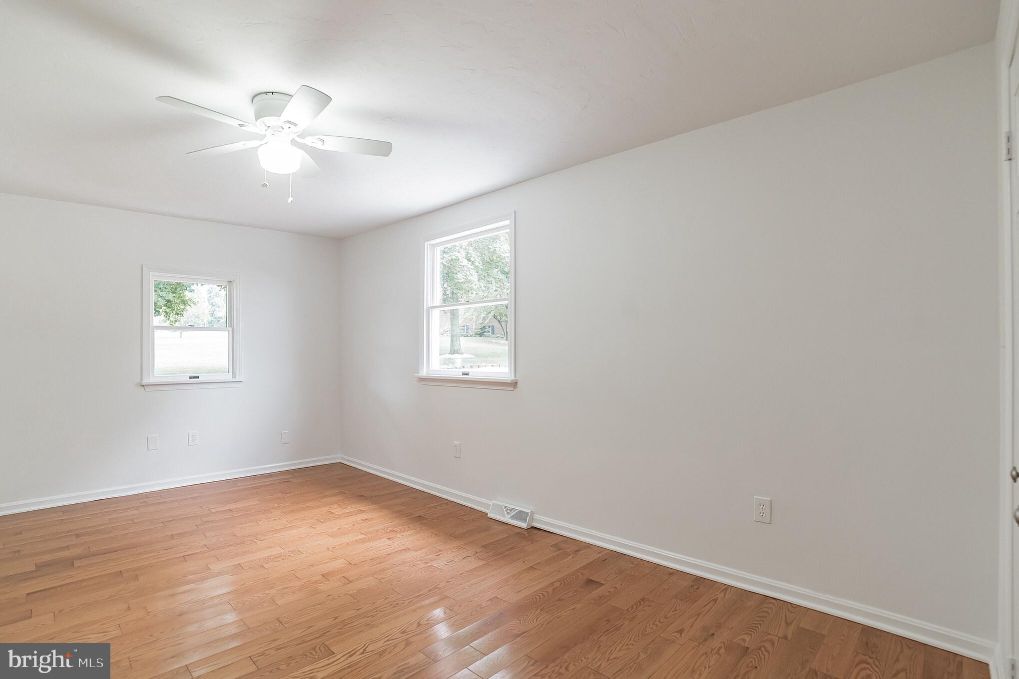 345 Pine Grove Road Hanover, PA 17331 - Photo 23 of 37 wooden floor in an empty room with a window