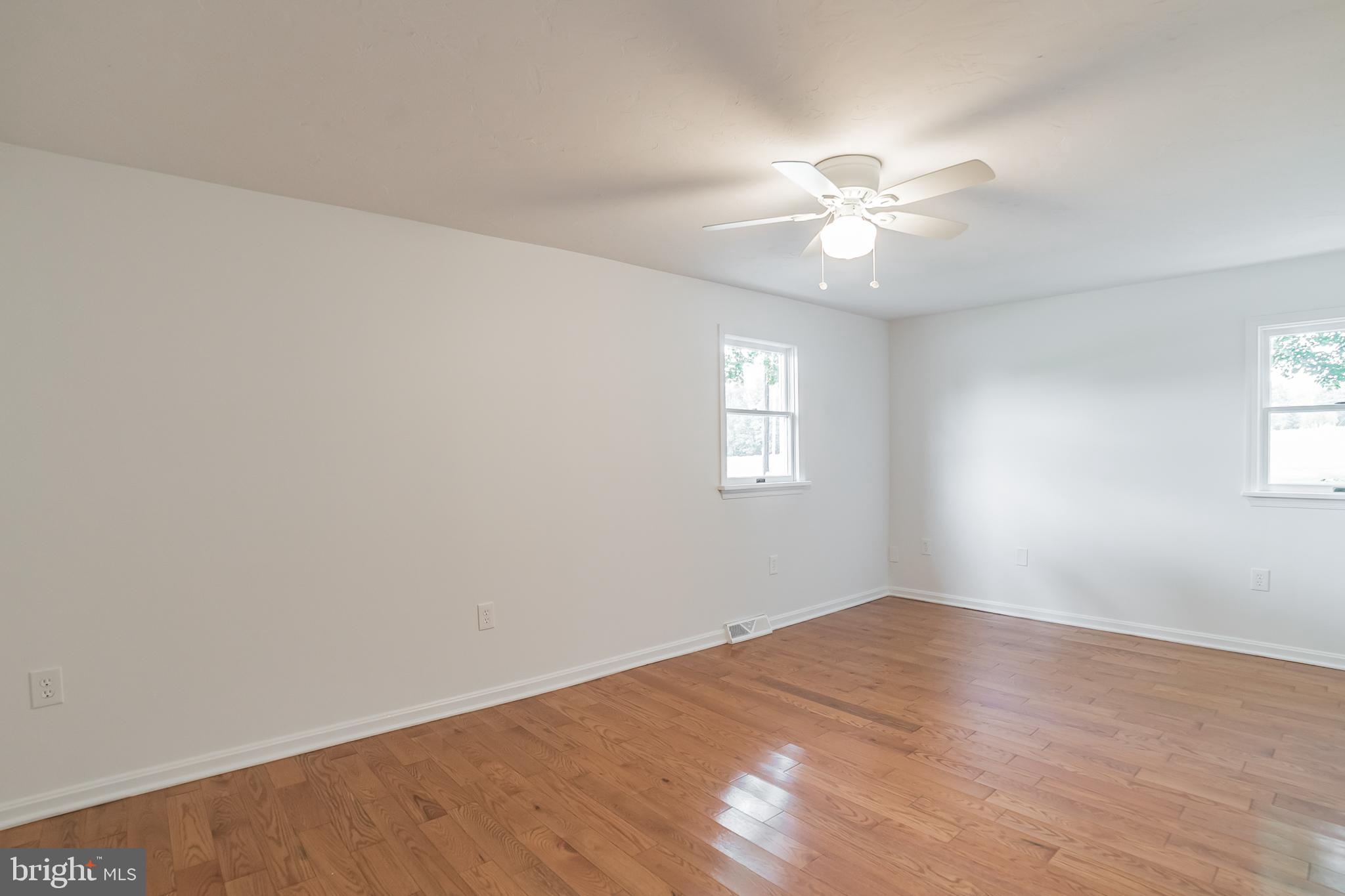 345 Pine Grove Road Hanover, PA 17331 - Photo 25 of 37 an empty room with a window and a fan