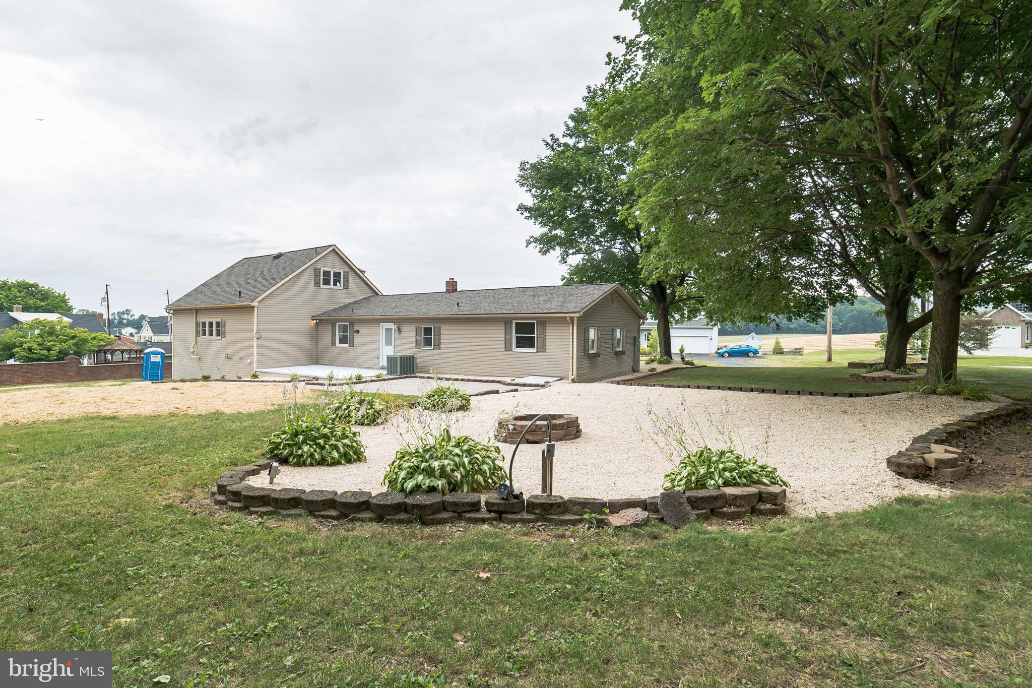 345 Pine Grove Road Hanover, PA 17331 - Photo 28 of 37 a front view of a house with garden