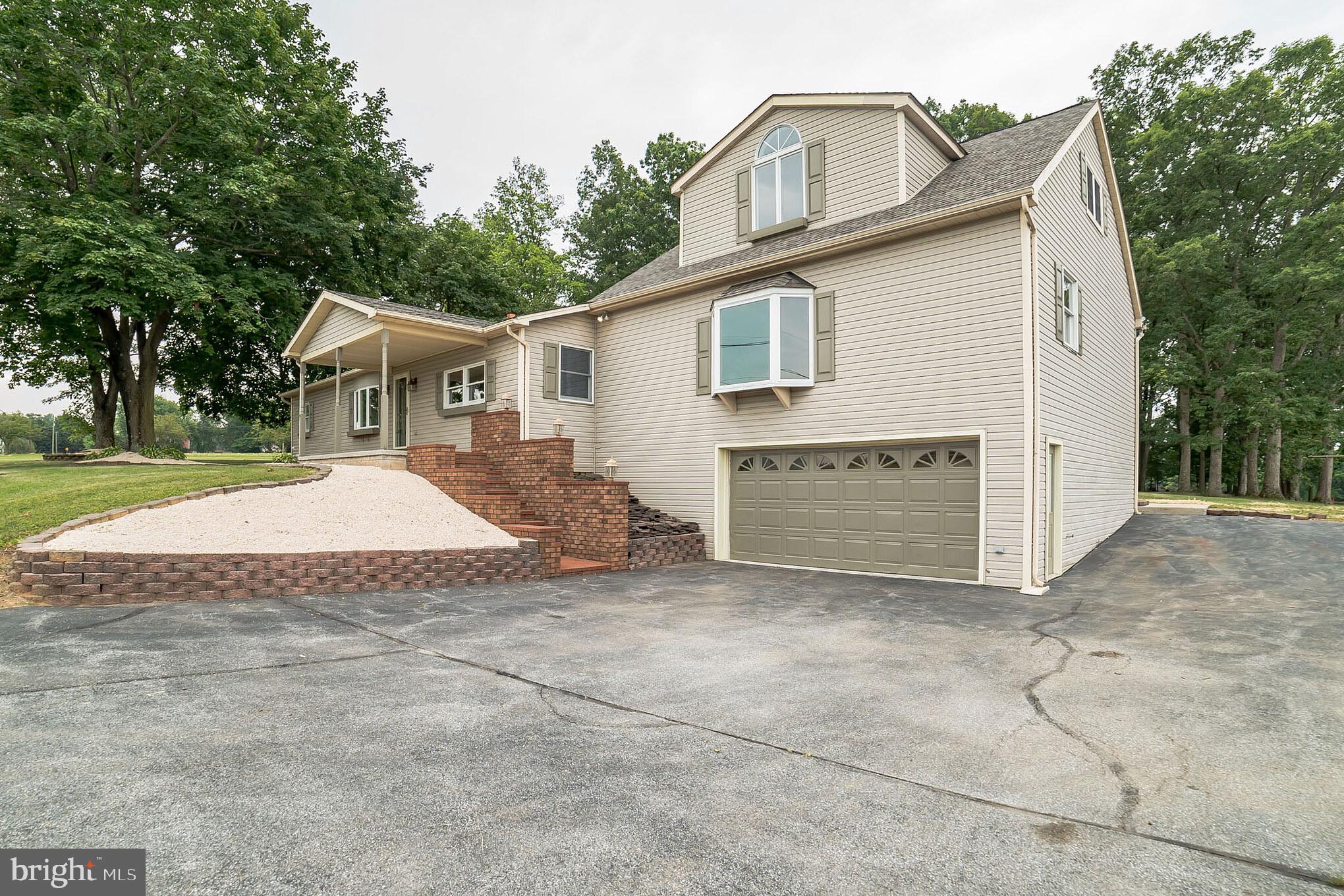 345 Pine Grove Road Hanover, PA 17331 - Photo 32 of 37 a view of a house with a yard and large tree