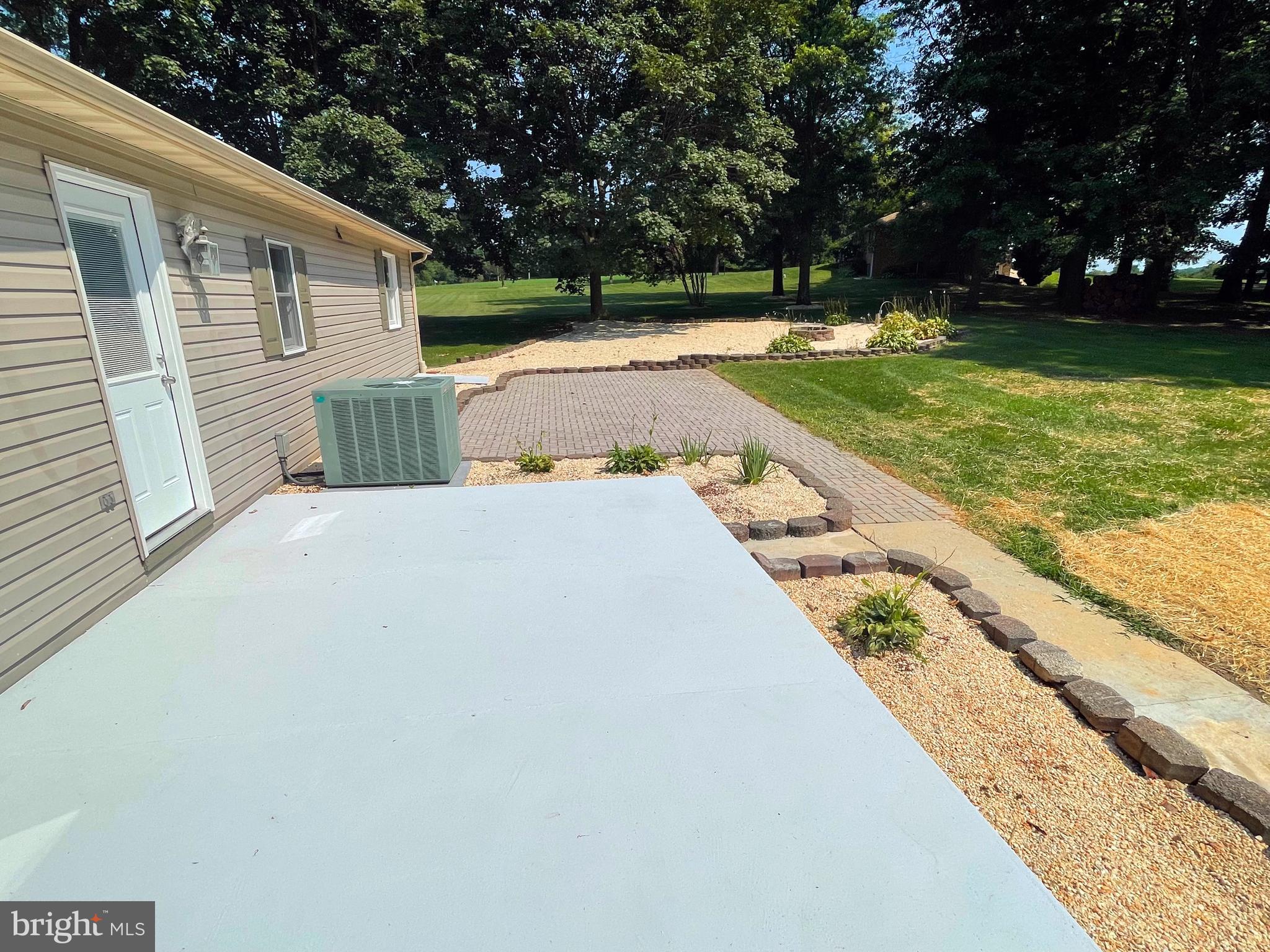 345 Pine Grove Road Hanover, PA 17331 - Photo 35 of 37 a view of a backyard with a garden
