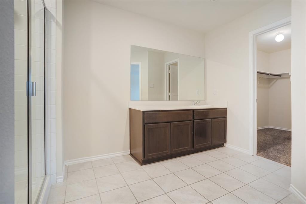 2328 Stefani Street Anna, TX 75409 - Photo 14 of 23 a room with a sink and cabinets