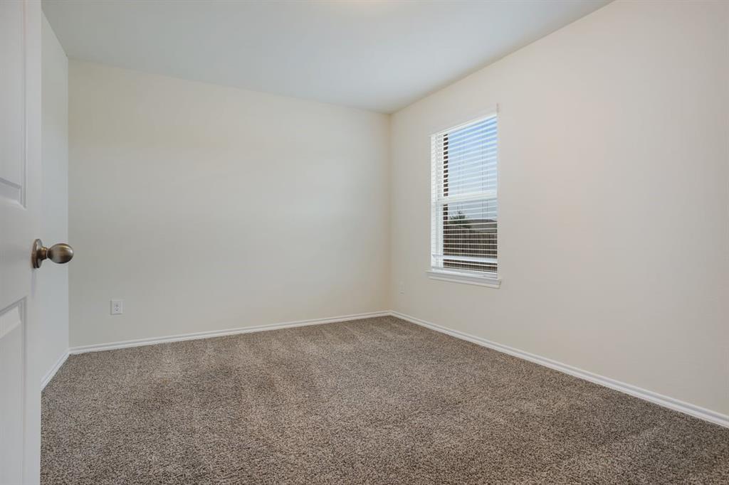 2328 Stefani Street Anna, TX 75409 - Photo 17 of 23 a view of an empty room with a window
