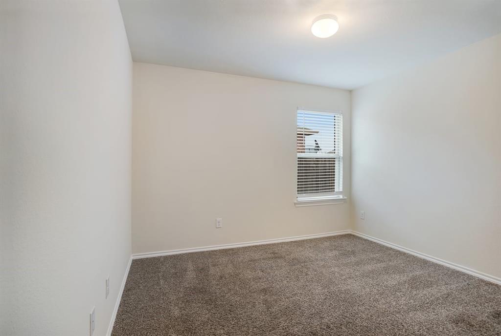 2328 Stefani Street Anna, TX 75409 - Photo 19 of 23 an empty room with a window