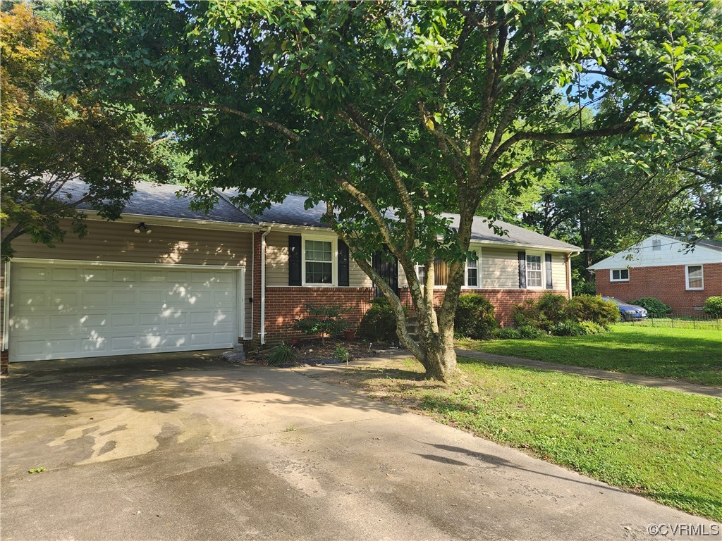 2315 Tignor Road Richmond, VA 23224 - Photo 23 of 23 a view of a house with a yard