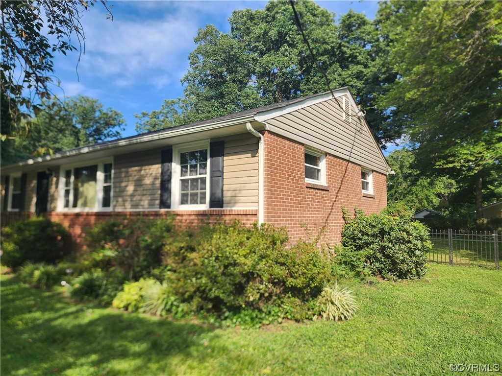 2315 Tignor Road Richmond, VA 23224 - Photo 4 of 23 a house view with a garden space