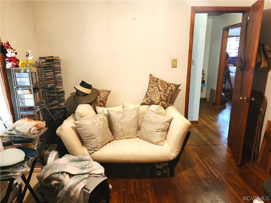 2315 Tignor Road Richmond, VA 23224 - Photo 8 of 23 a living room with furniture and a fireplace