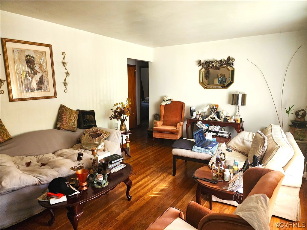 2315 Tignor Road Richmond, VA 23224 - Photo 9 of 23 a living room with furniture and wooden floor
