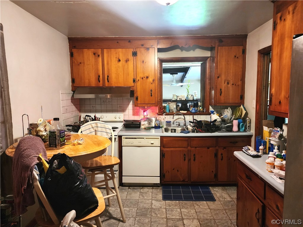 2315 Tignor Road Richmond, VA 23224 - Photo 10 of 23 a bathroom with a sink and a mirror