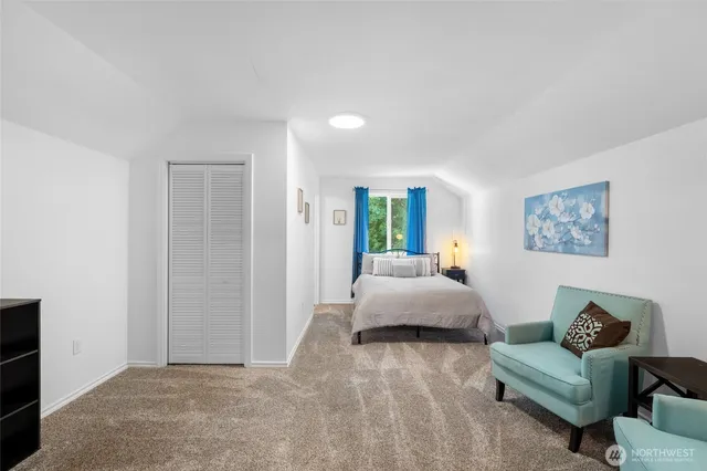 a bedroom with furniture and a bed