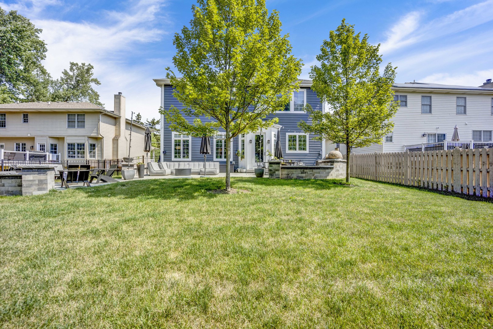 355 St Charles Road Glen Ellyn, IL 60137 - Photo 20 of 44 a large tree in front of a house