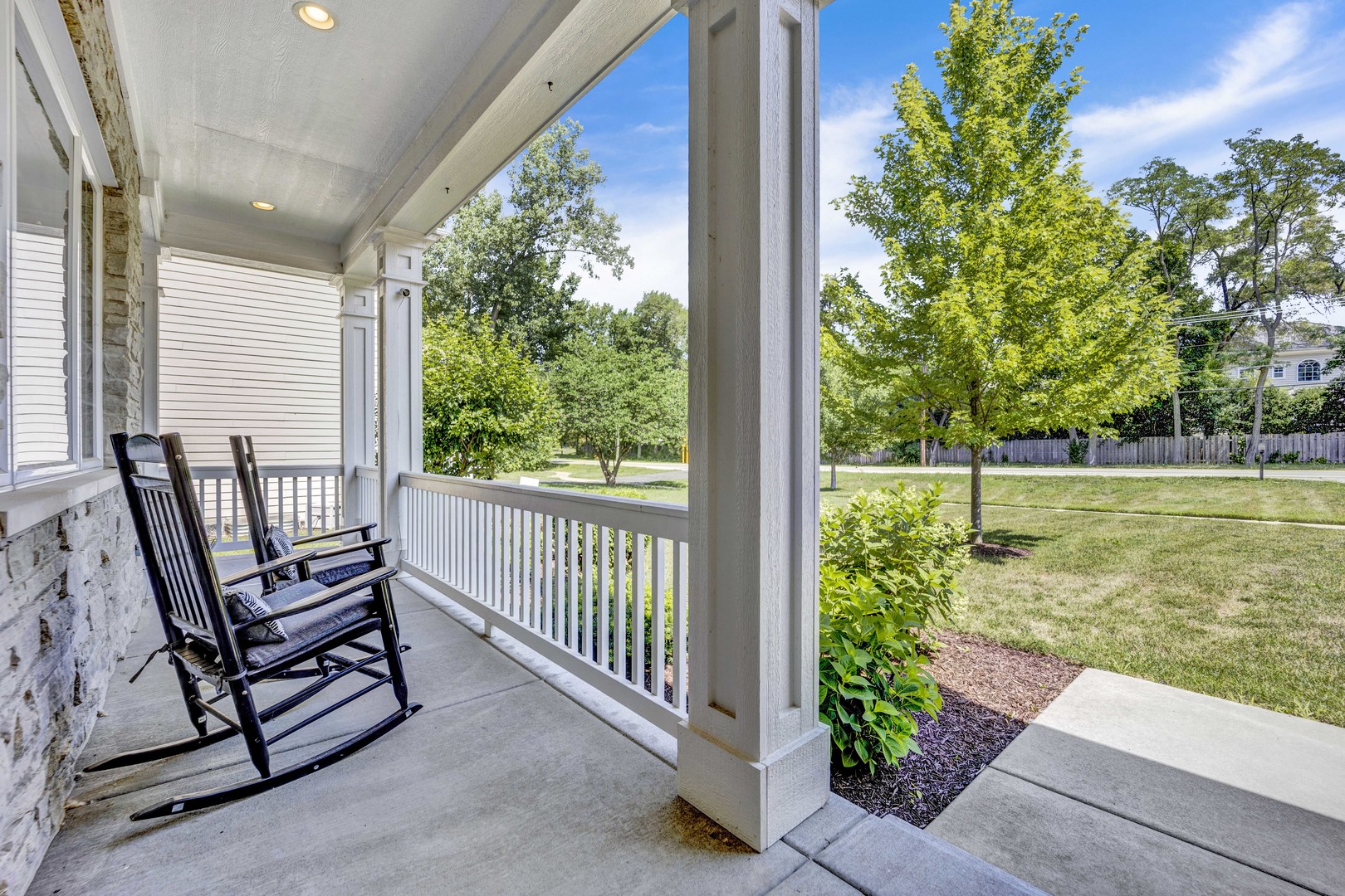 355 St Charles Road Glen Ellyn, IL 60137 - Photo 2 of 44 a view of a chair in backyard of the house