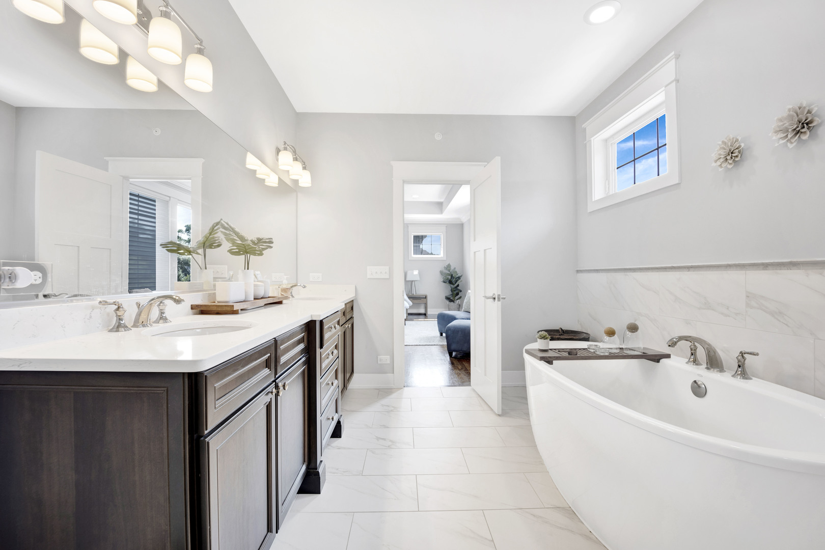 355 St Charles Road Glen Ellyn, IL 60137 - Photo 28 of 44 a bathroom with a sink a tub and a mirror