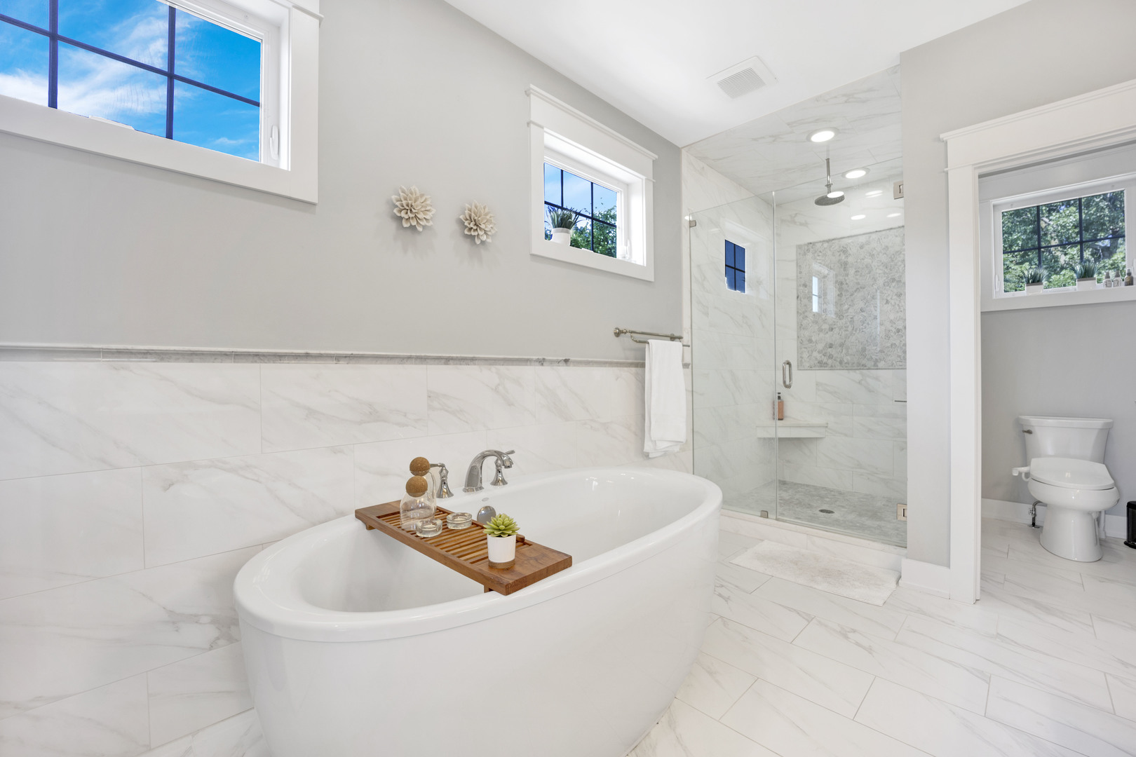 355 St Charles Road Glen Ellyn, IL 60137 - Photo 29 of 44 a bathroom with a sink a toilet and shower