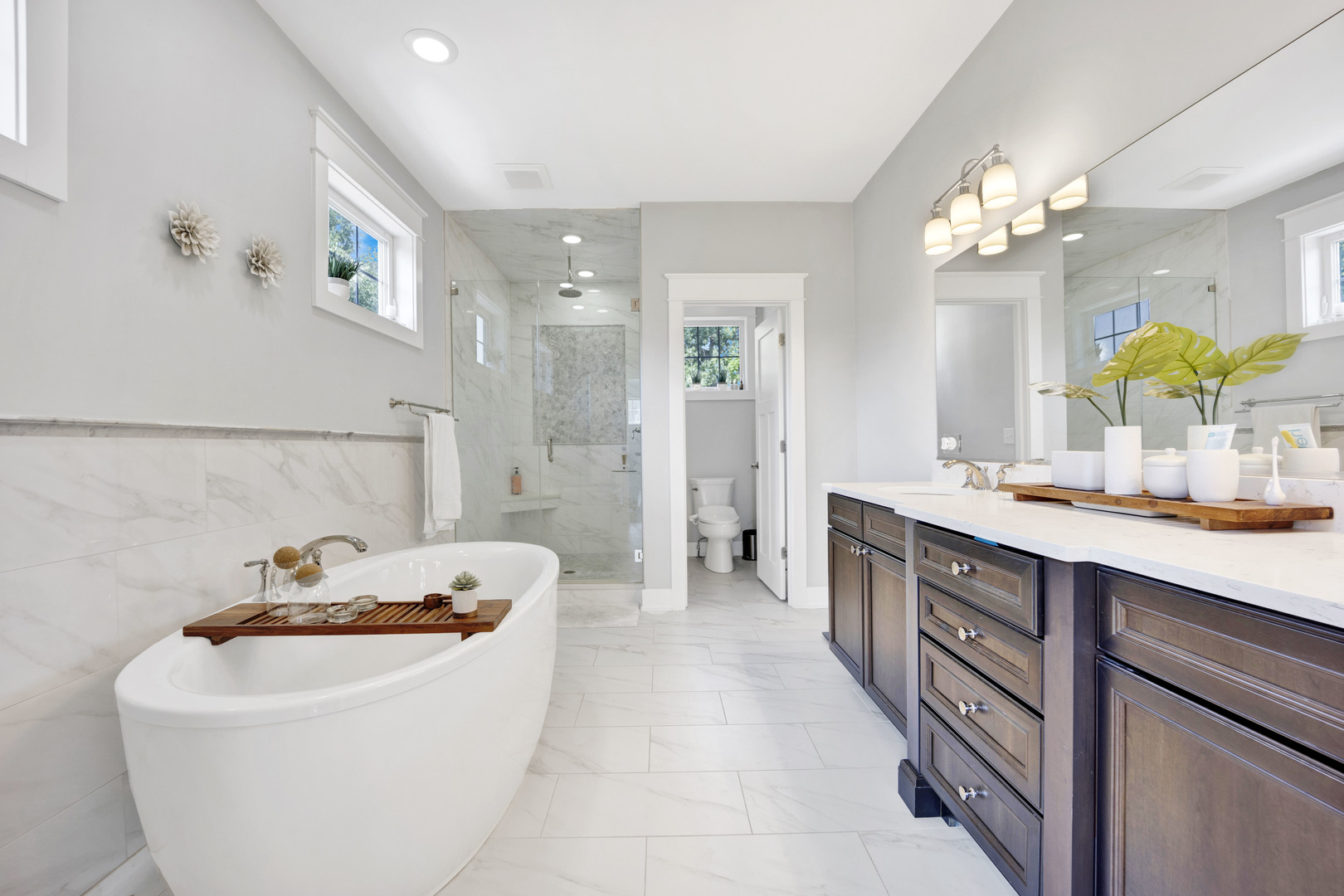 355 St Charles Road Glen Ellyn, IL 60137 - Photo 30 of 44 a bathroom with a tub sink and mirror