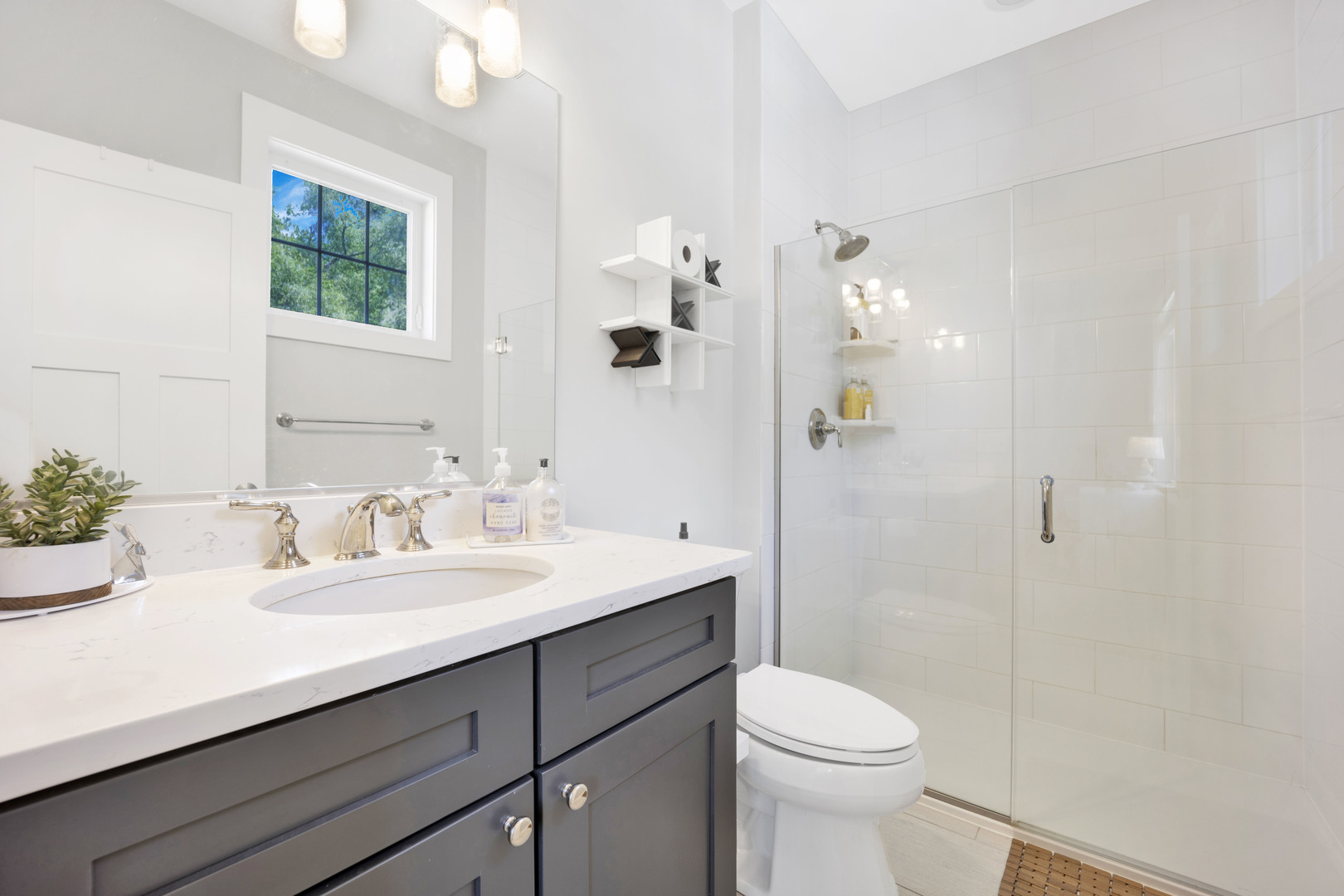 355 St Charles Road Glen Ellyn, IL 60137 - Photo 31 of 44 a bathroom with a sink a toilet and shower