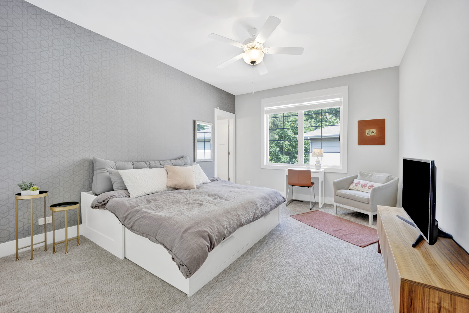 355 St Charles Road Glen Ellyn, IL 60137 - Photo 33 of 44 a spacious bedroom with a bed and a flat screen tv