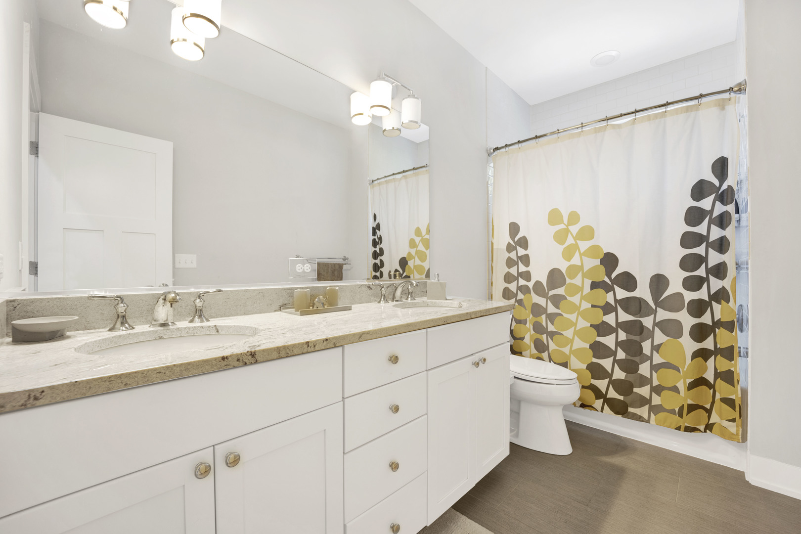 355 St Charles Road Glen Ellyn, IL 60137 - Photo 34 of 44 a spacious bathroom with a double vanity sink mirror and toilet