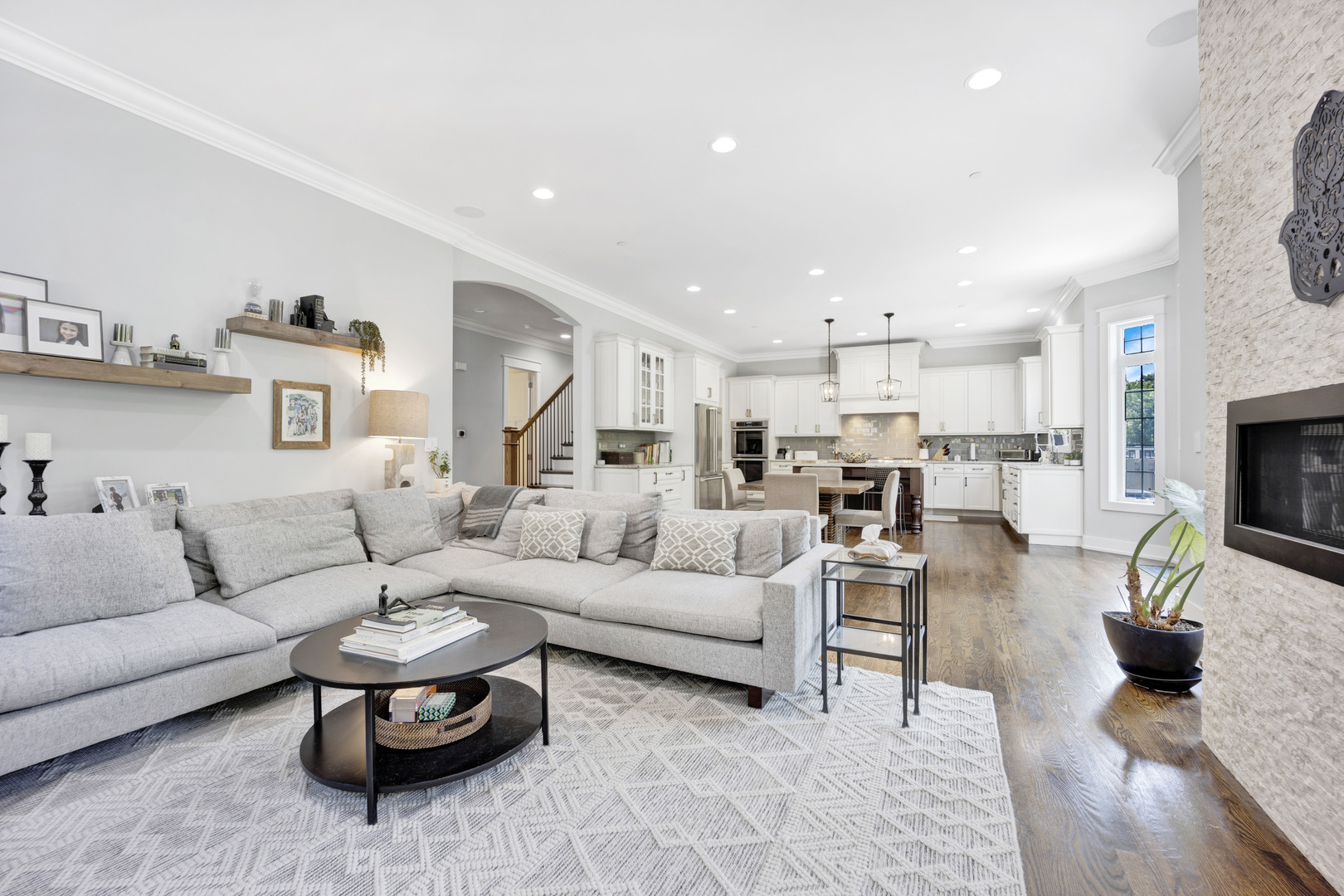 355 St Charles Road Glen Ellyn, IL 60137 - Photo 4 of 44 a living room with furniture and a fireplace