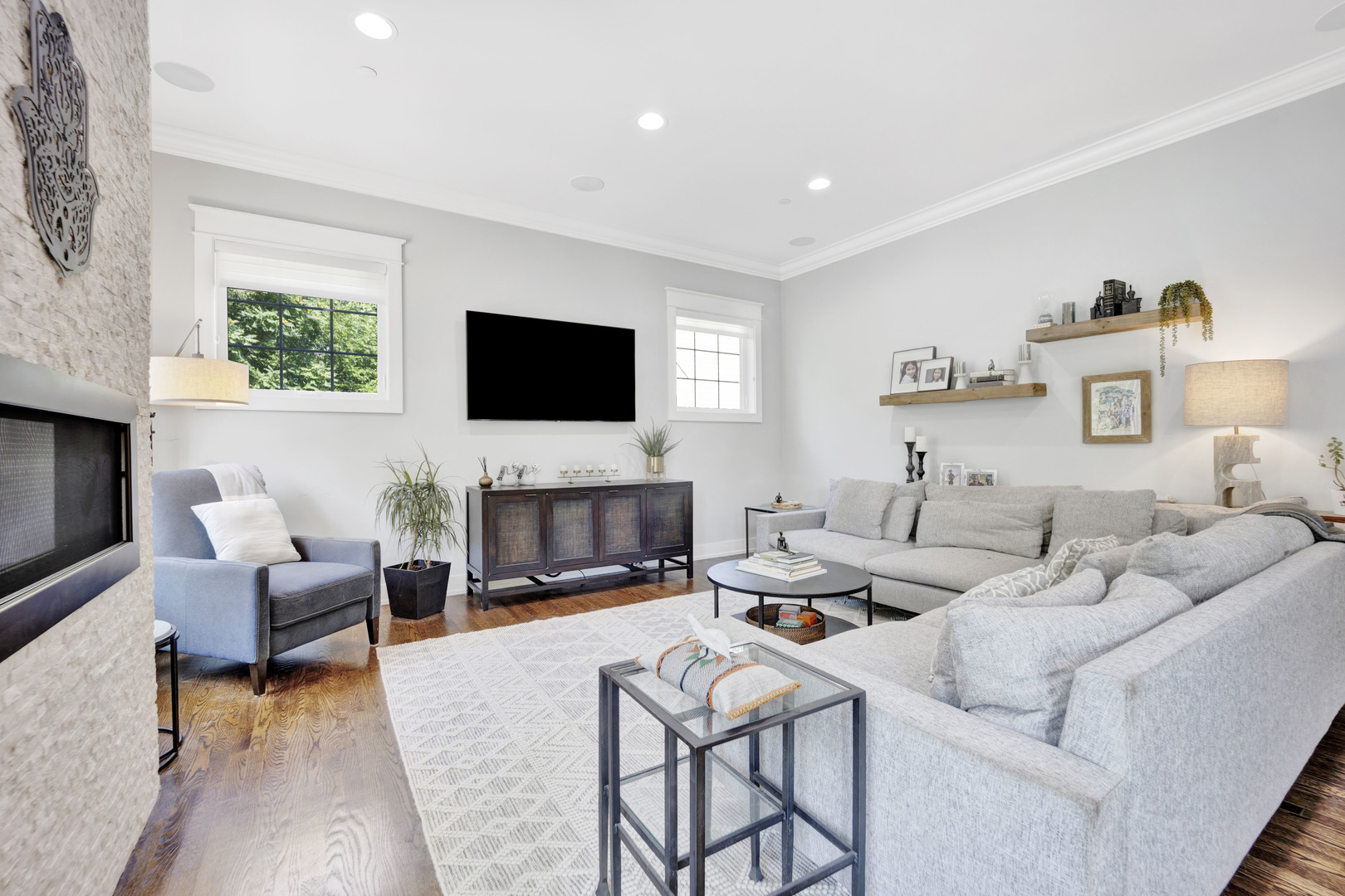 355 St Charles Road Glen Ellyn, IL 60137 - Photo 5 of 44 a living room with furniture a fireplace and a flat screen tv