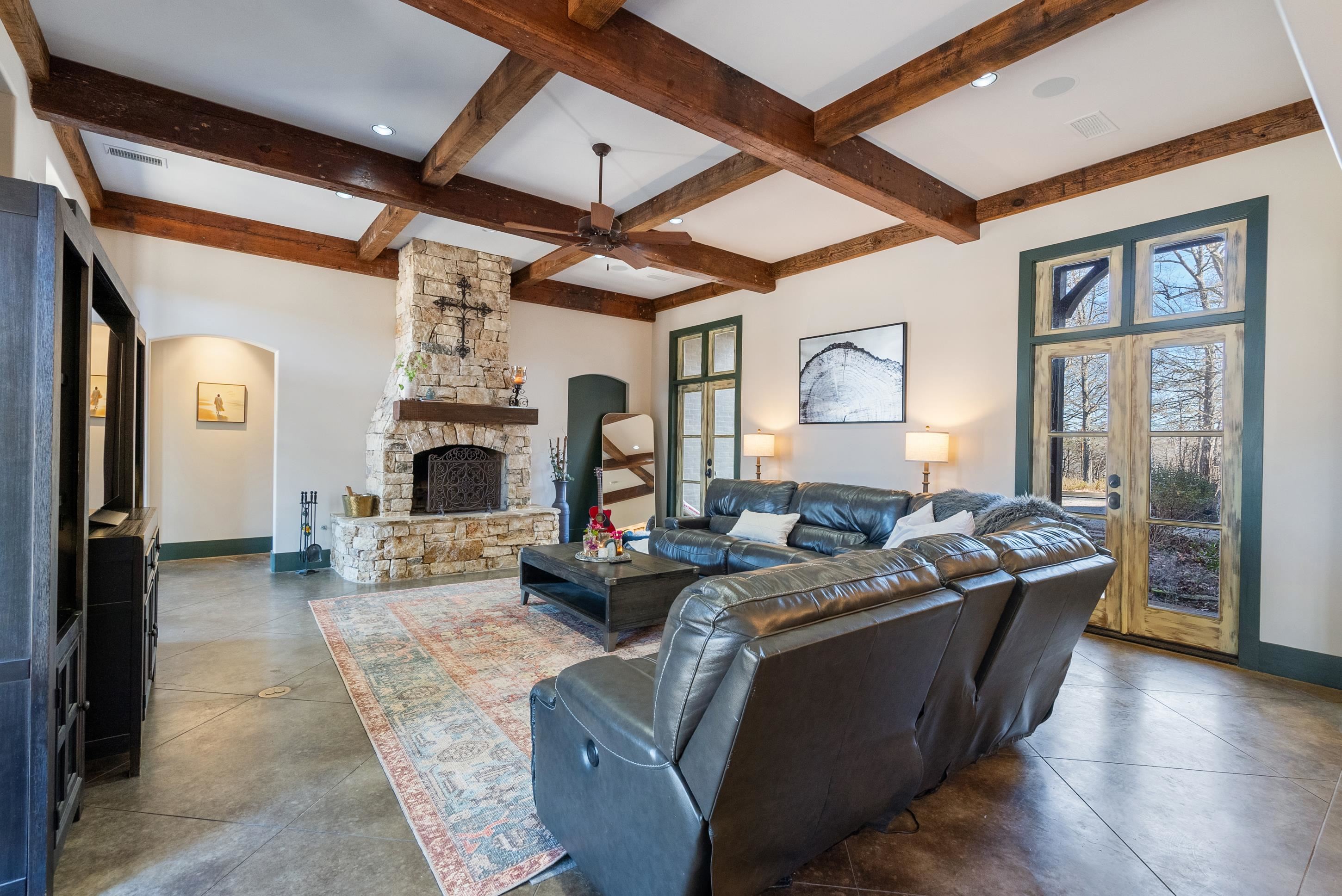 891 Musgray Road Holly Springs, MS 38635 - Photo 13 of 38 a living room with fireplace furniture and a fireplace