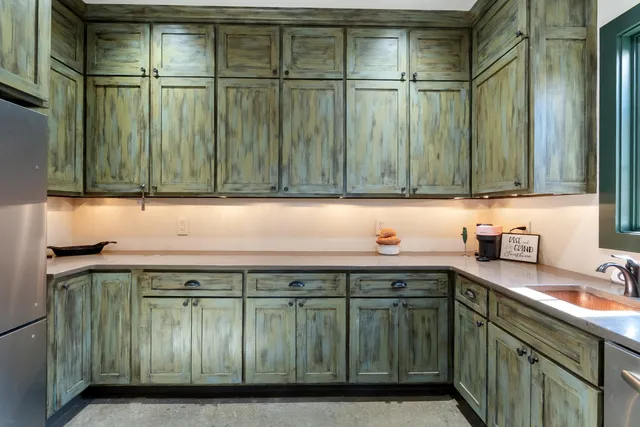 a utility room with cabinets