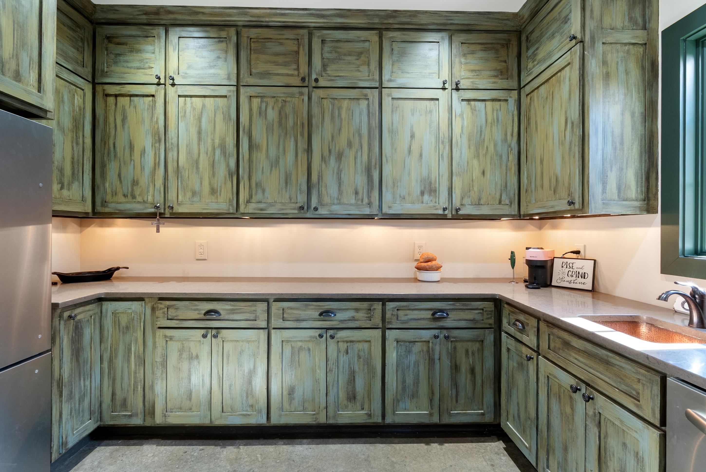891 Musgray Road Holly Springs, MS 38635 - Photo 19 of 38 a kitchen with a sink and cabinets