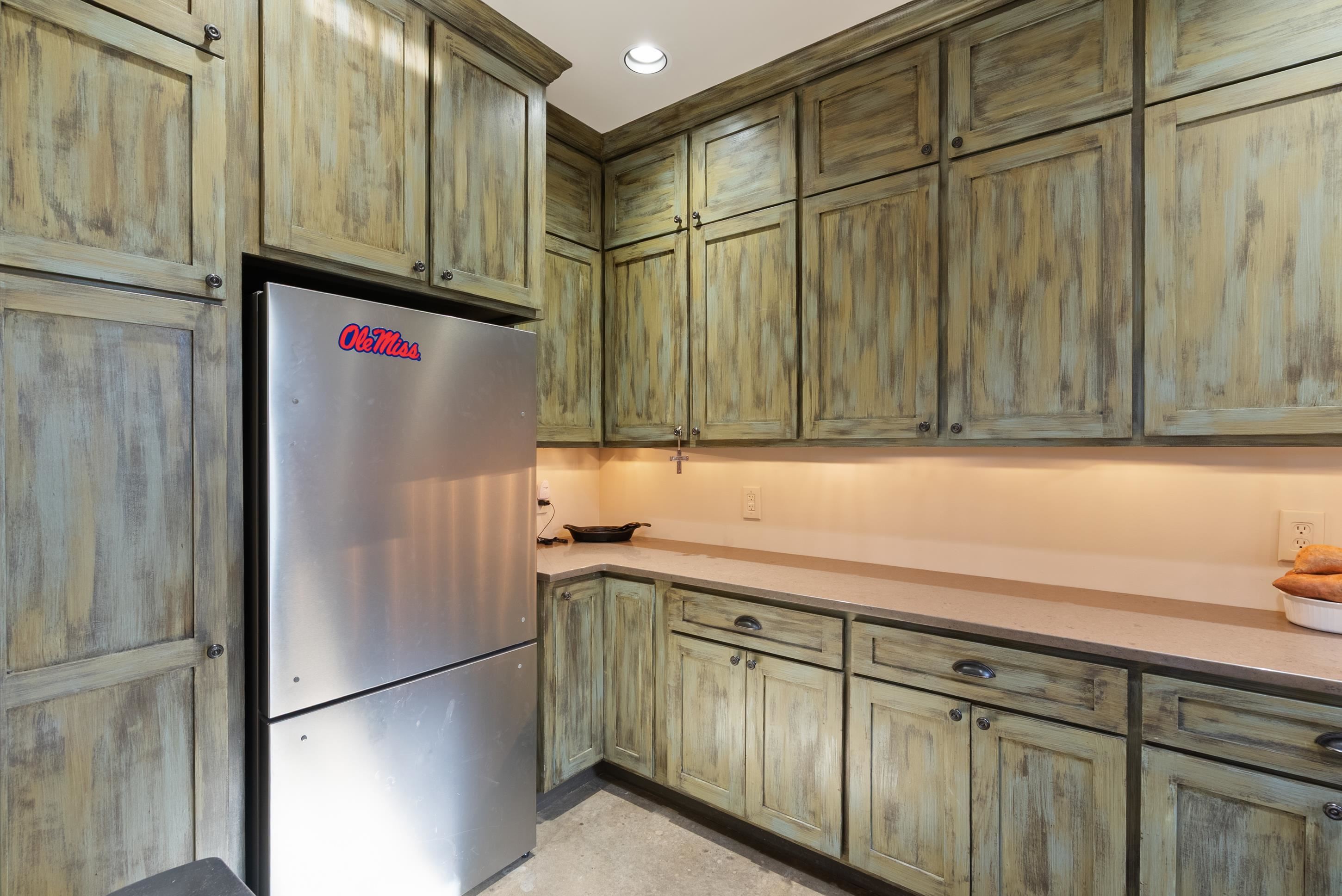 891 Musgray Road Holly Springs, MS 38635 - Photo 20 of 38 a utility room with cabinets