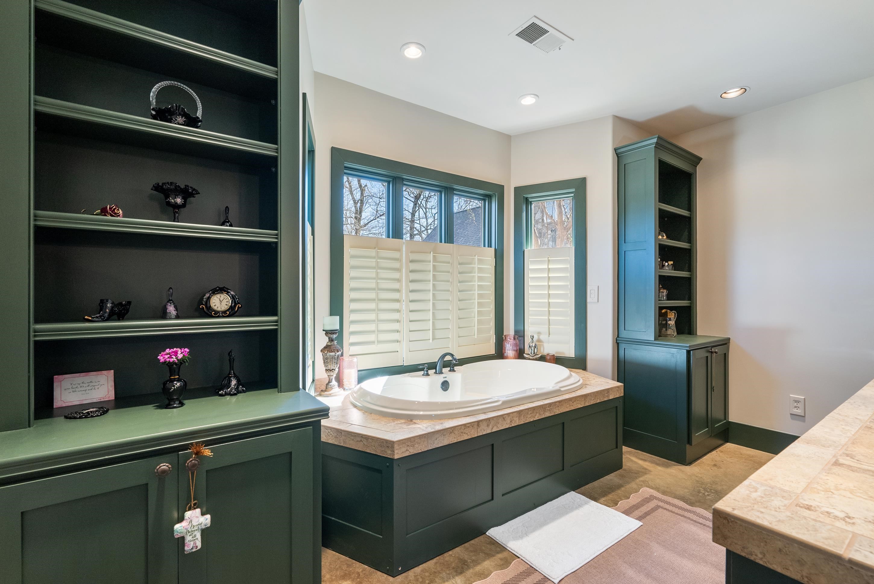 891 Musgray Road Holly Springs, MS 38635 - Photo 26 of 38 a bathroom with a sink and a window