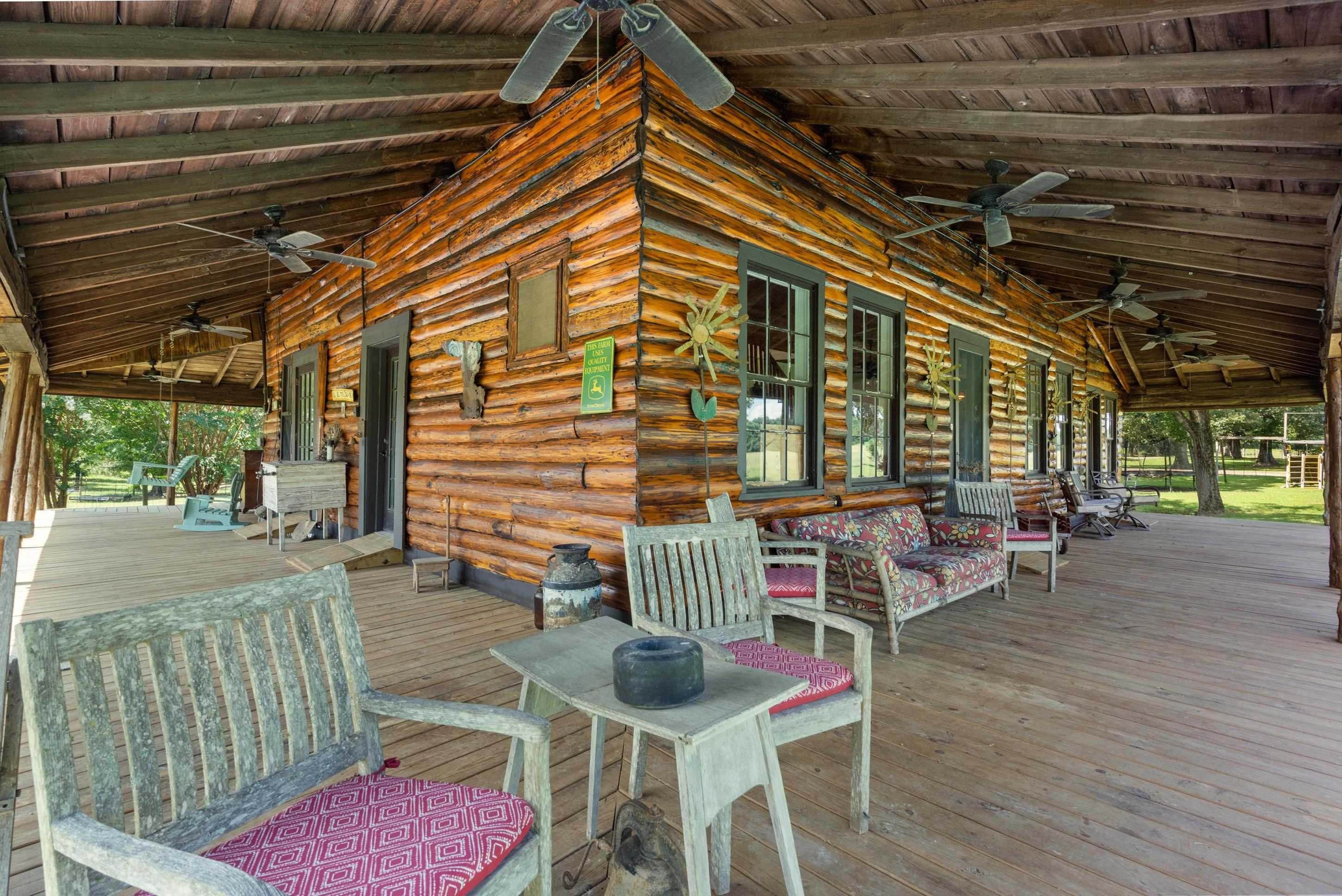 891 Musgray Road Holly Springs, MS 38635 - Photo 30 of 38 a patio with glass top table and chairs