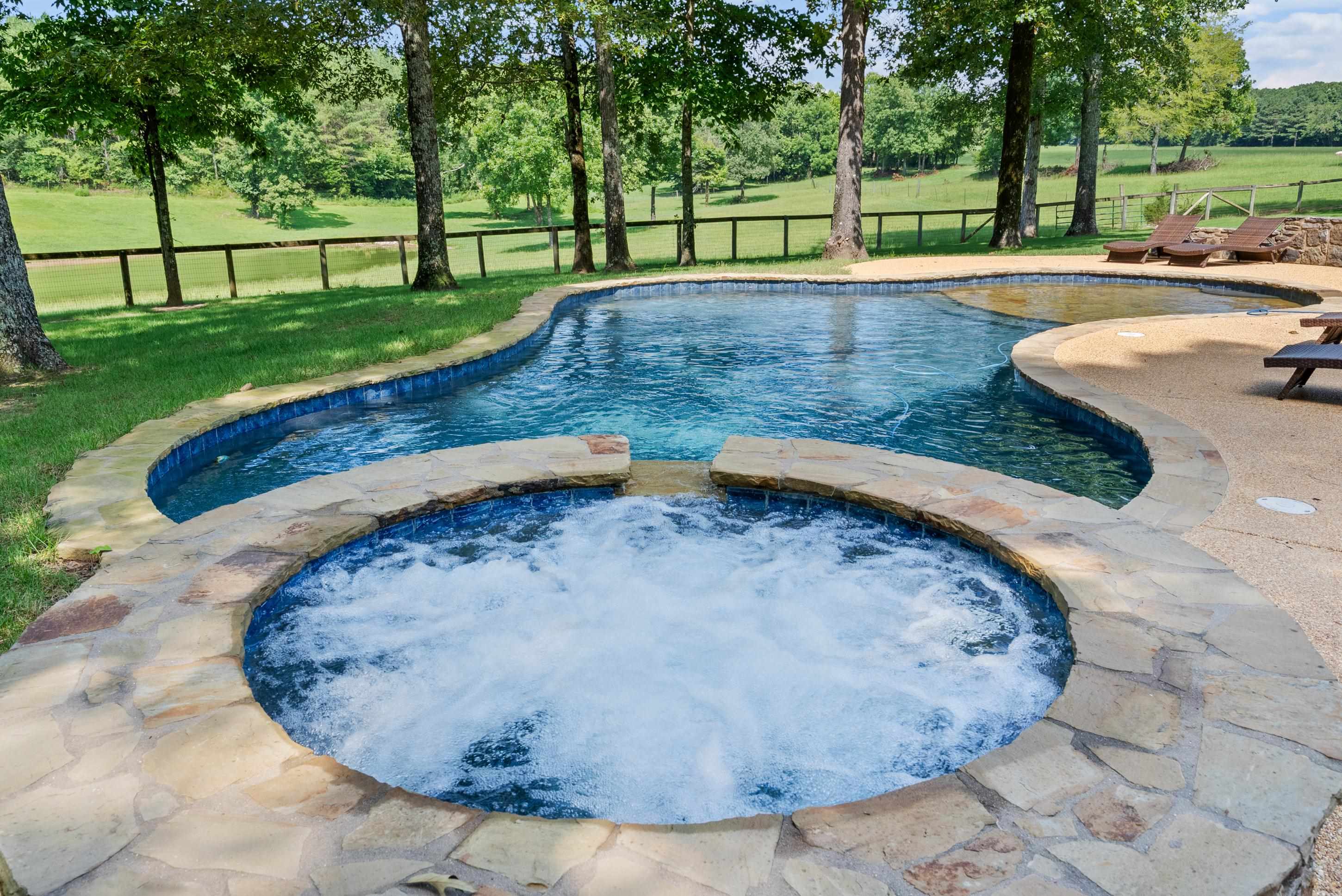 891 Musgray Road Holly Springs, MS 38635 - Photo 3 of 38 a view of a swimming pool with a yard