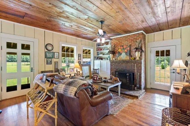 a kitchen with a sink cabinets and window