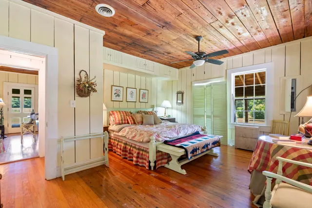 a view of a swimming pool with a yard