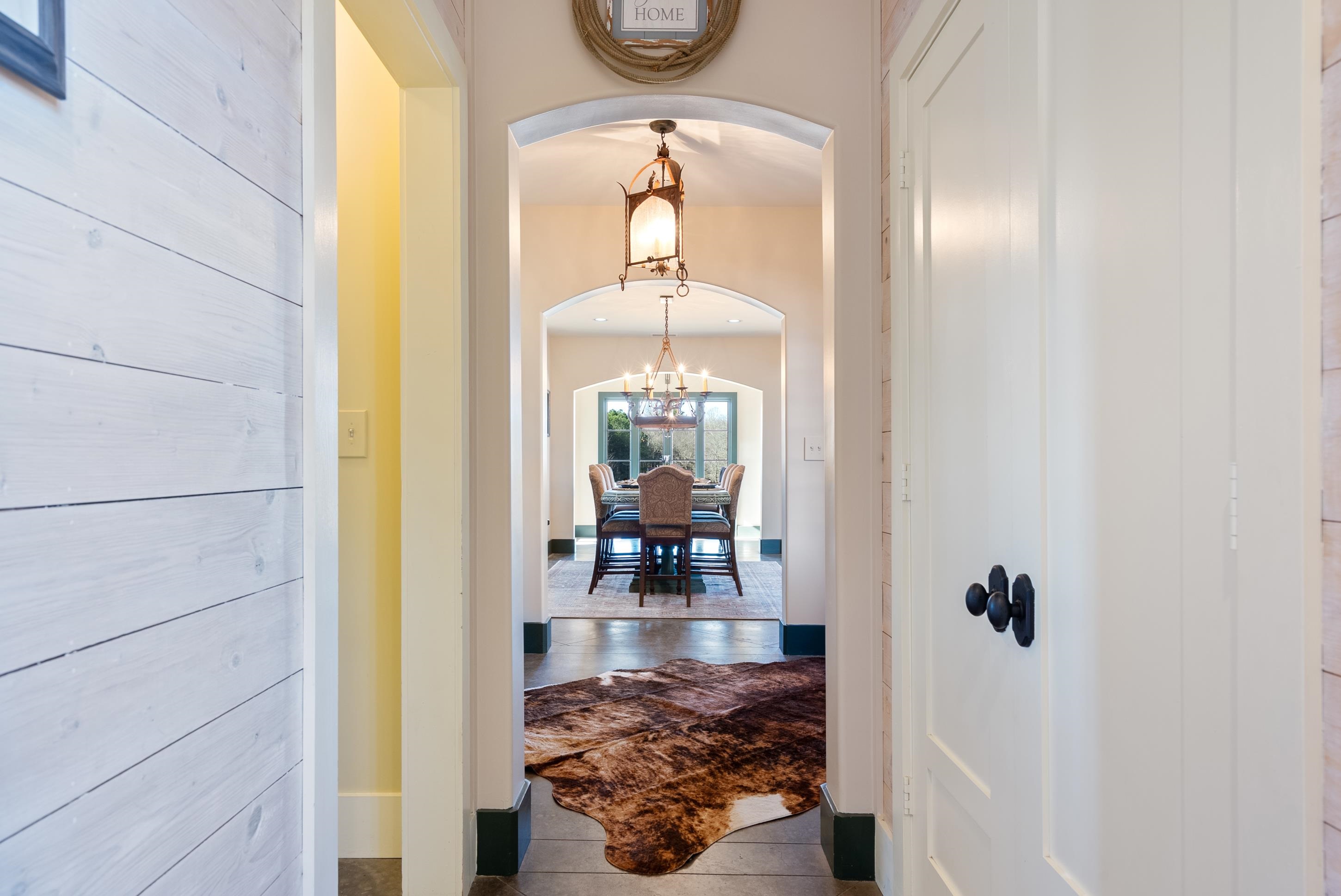 891 Musgray Road Holly Springs, MS 38635 - Photo 7 of 38 a view of a hallway with wooden floor windows and entryway