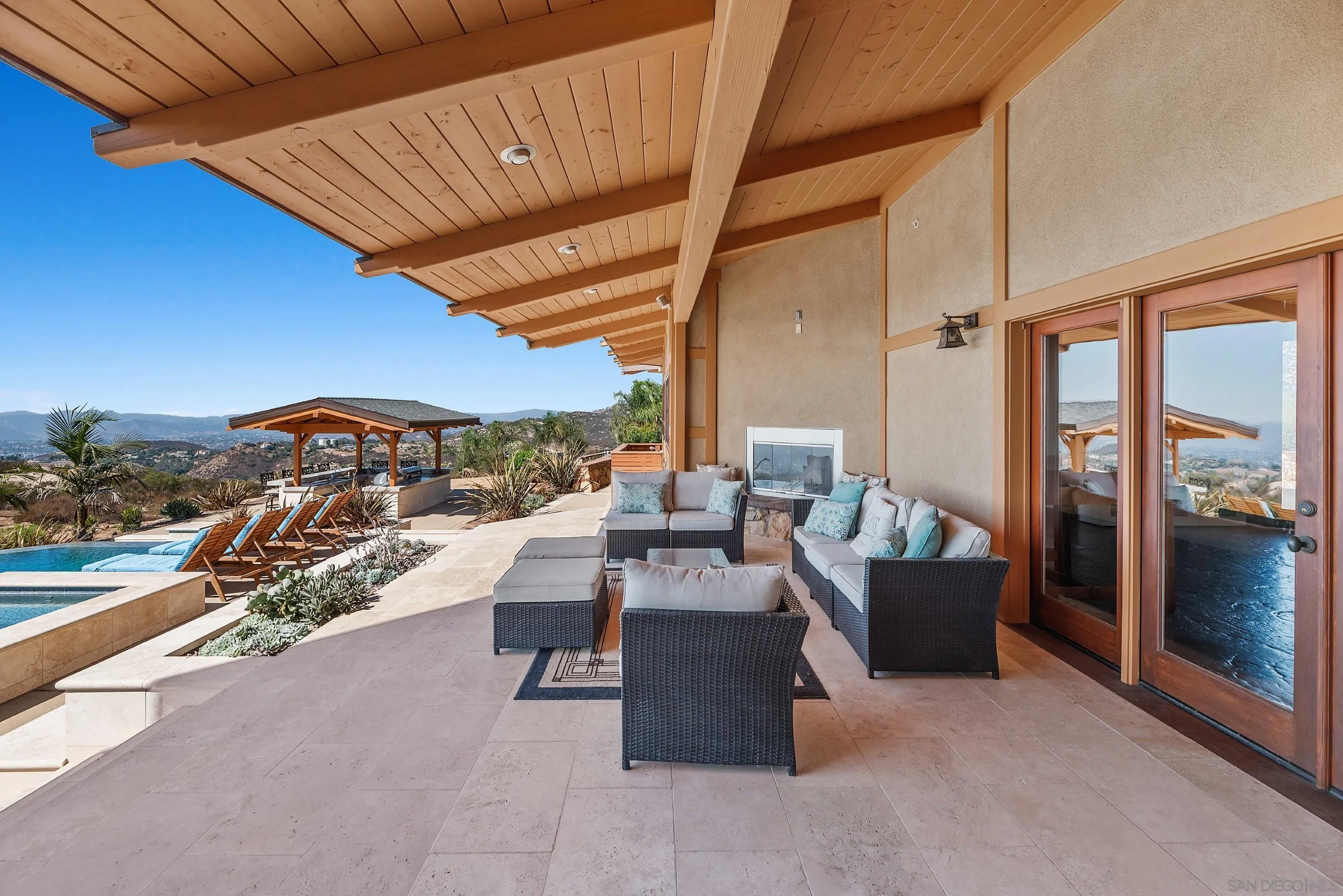15535 Westview Road Poway, CA 92064 - Photo 49 of 74 a view of living room kitchen and patio