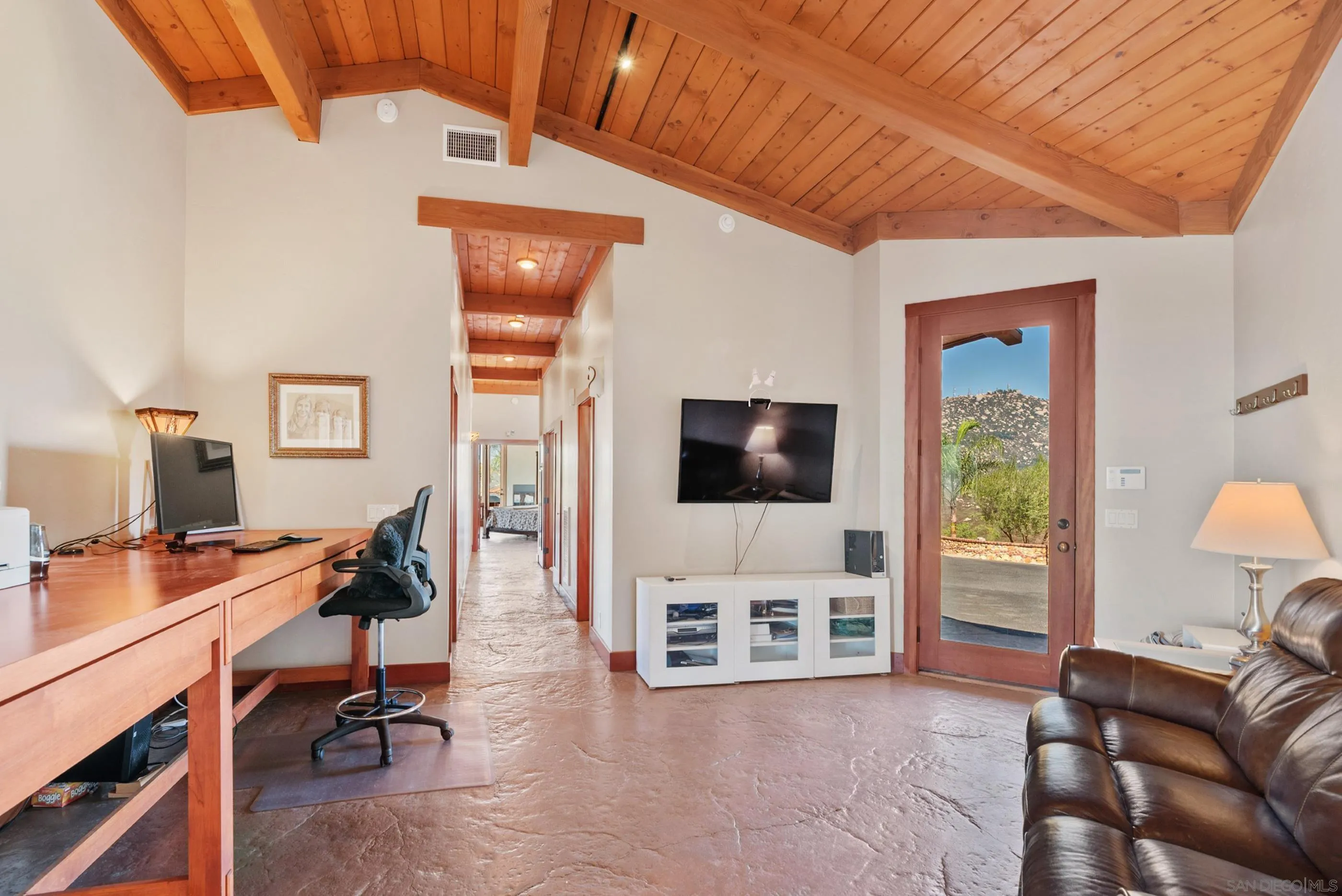 15535 Westview Road Poway, CA 92064 - Photo 63 of 74 a view of a livingroom with workspace and a window