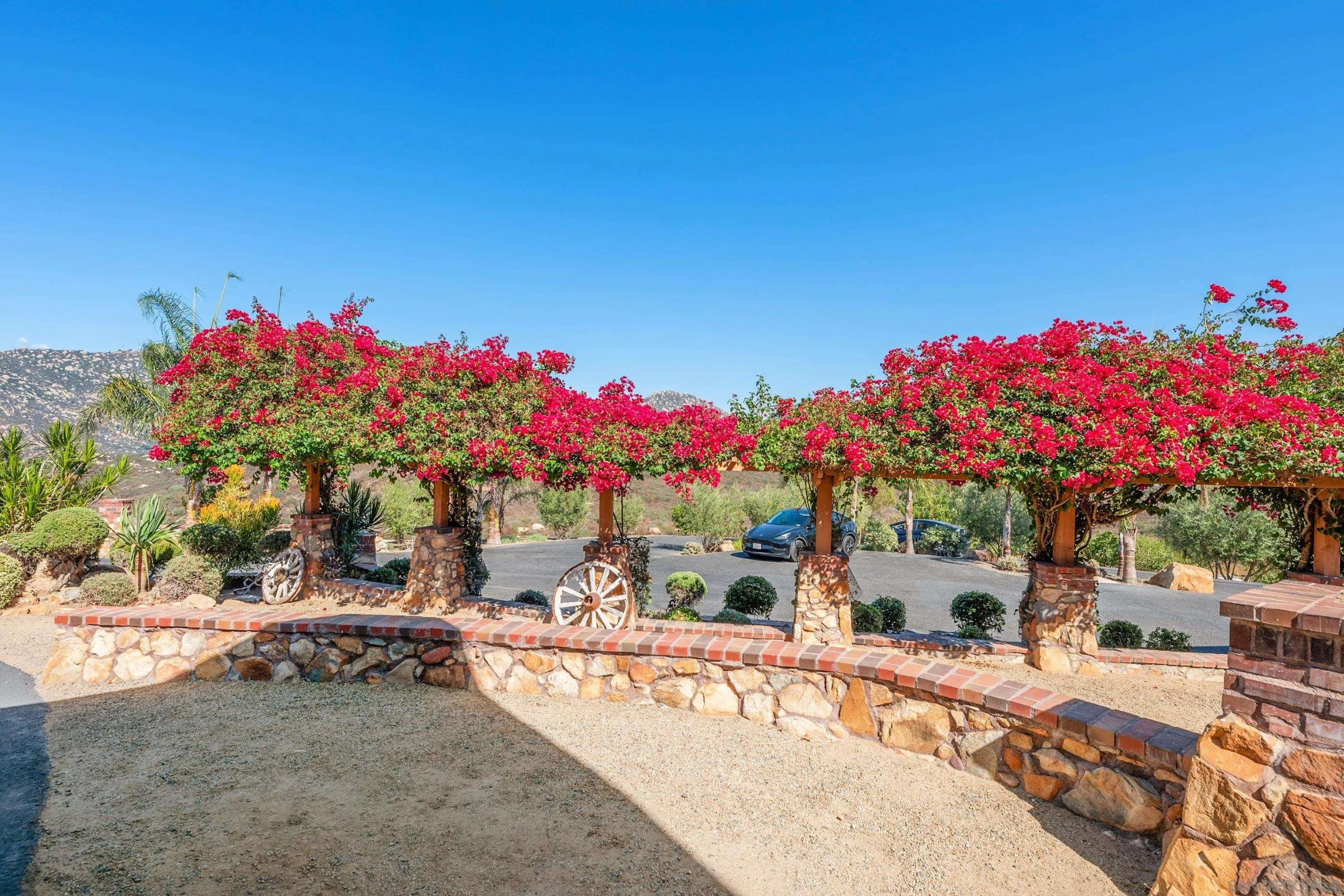 15535 Westview Road Poway, CA 92064 - Photo 72 of 74 a front view of a house with a yard and a tree
