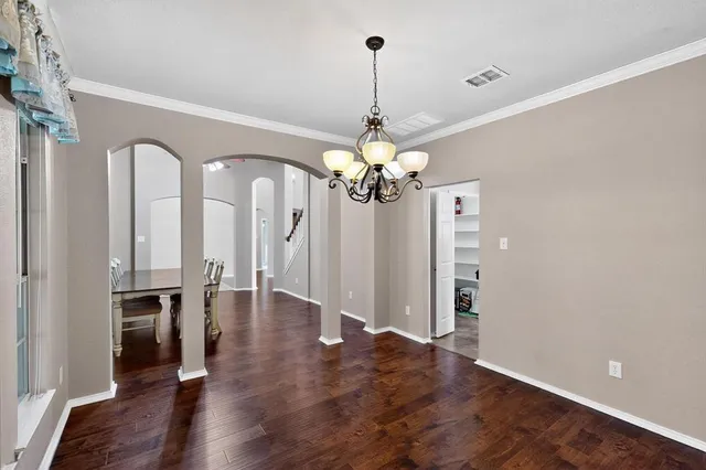 a view of a chandelier in a room
