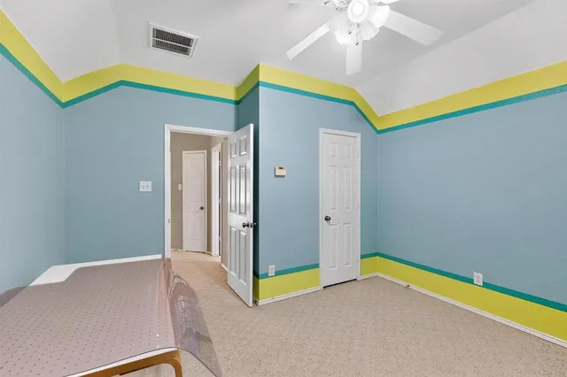 a living room with a bed