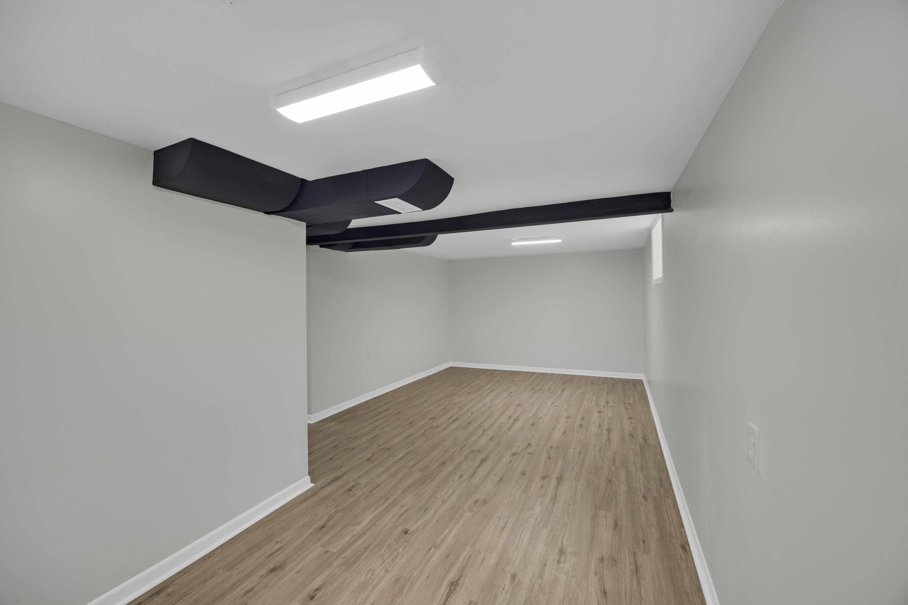 5428 Chestnut Avenue Hammond, IN 46320 - Photo 17 of 20 a view of an empty room with wooden floor