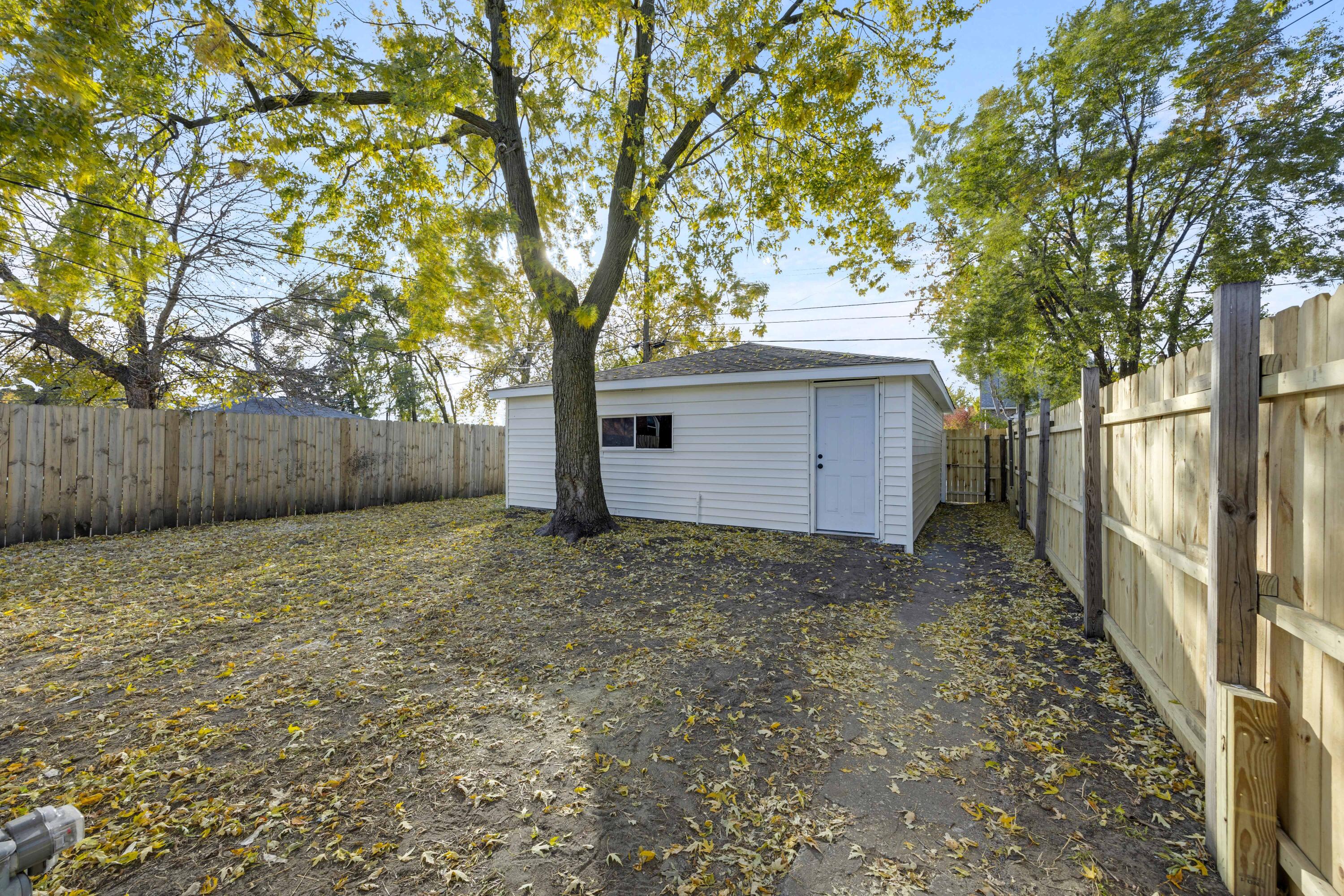 5428 Chestnut Avenue Hammond, IN 46320 - Photo 19 of 20 a backyard of a house with lots of green space