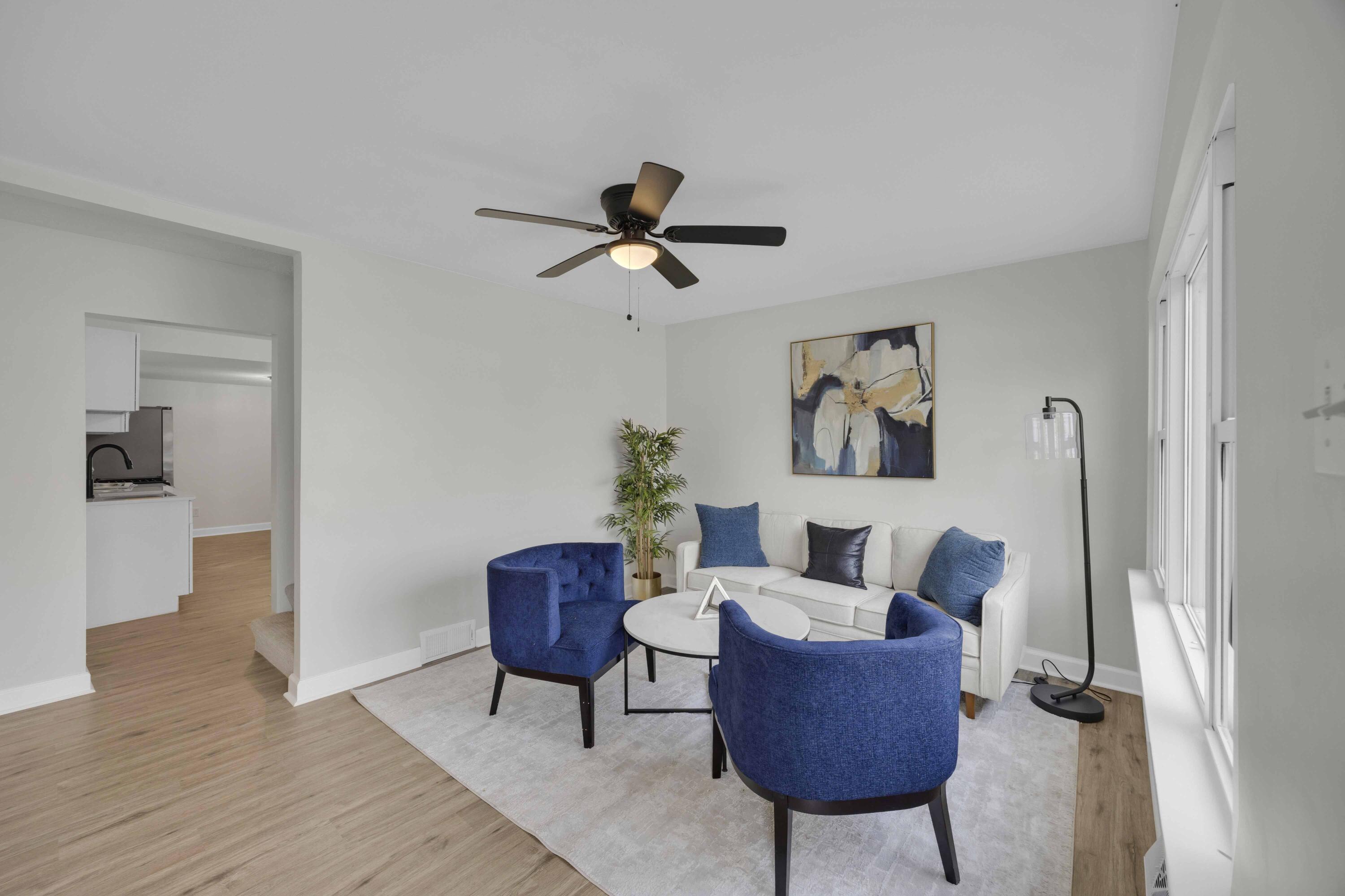 5428 Chestnut Avenue Hammond, IN 46320 - Photo 4 of 20 a living room with furniture and a rug