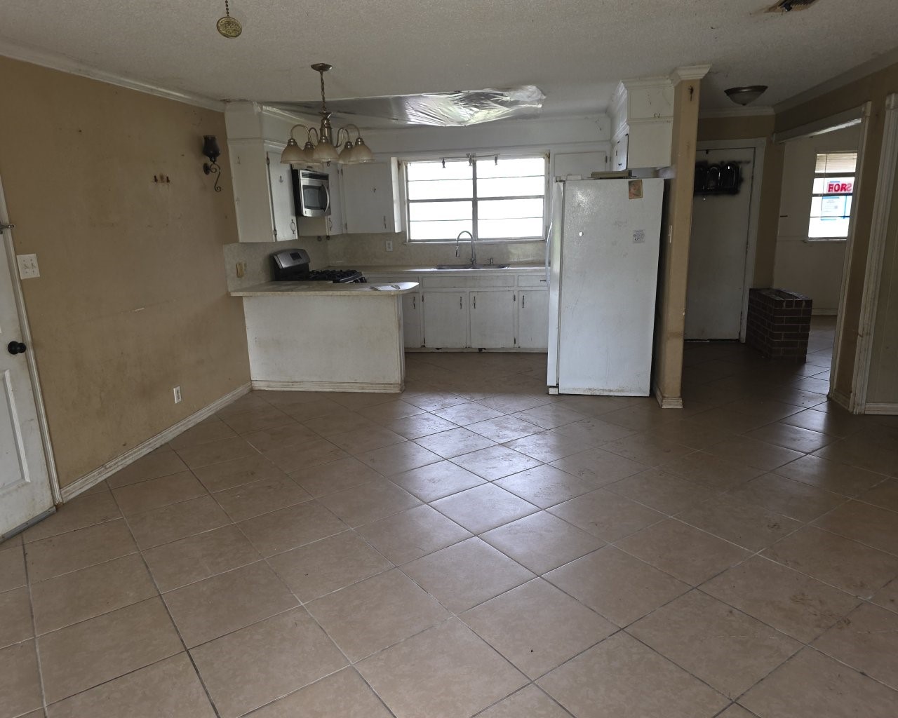 408 Dwyer Street Angleton, TX 77515 - Photo 3 of 17 View of the kitchen from the living room