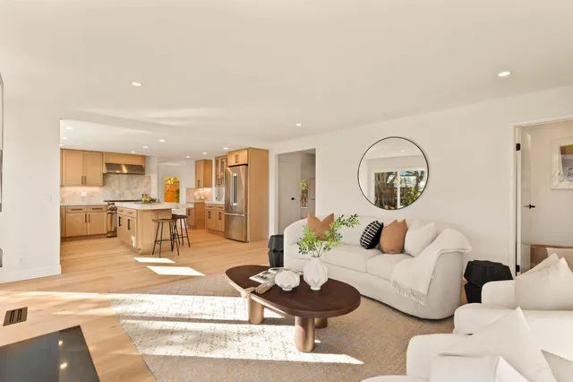 a bathroom with a window and a toilet