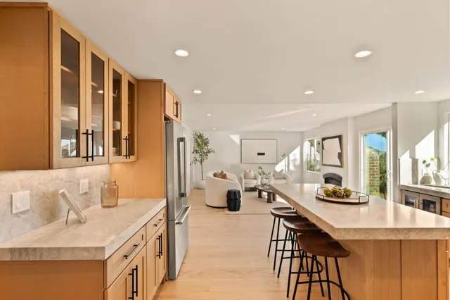 a spacious bedroom with a bed and a couch