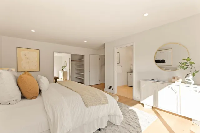 a bathroom with a granite countertop sink mirror and