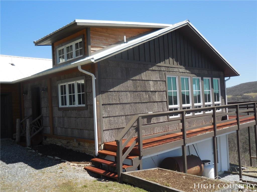 1071 Elk Hill Road Banner Elk, NC 28604 - Photo 26 of 28 a house view with a backyard space