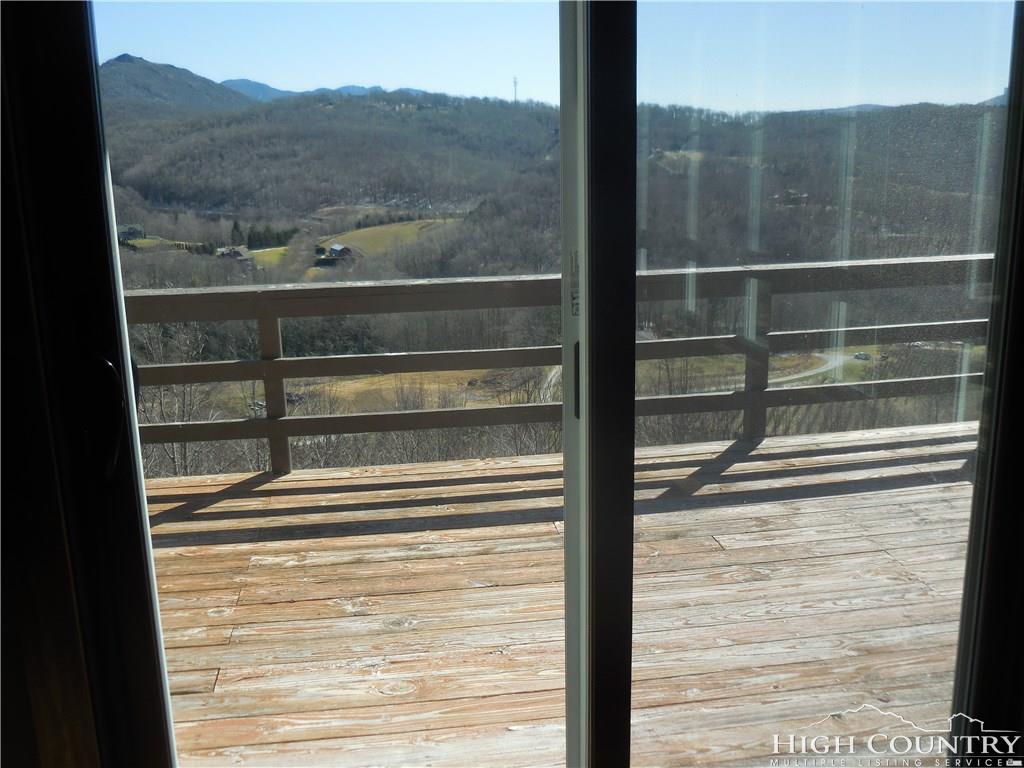 1071 Elk Hill Road Banner Elk, NC 28604 - Photo 10 of 28 a view of a door and a window