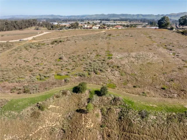 a view of an ocean and mountain